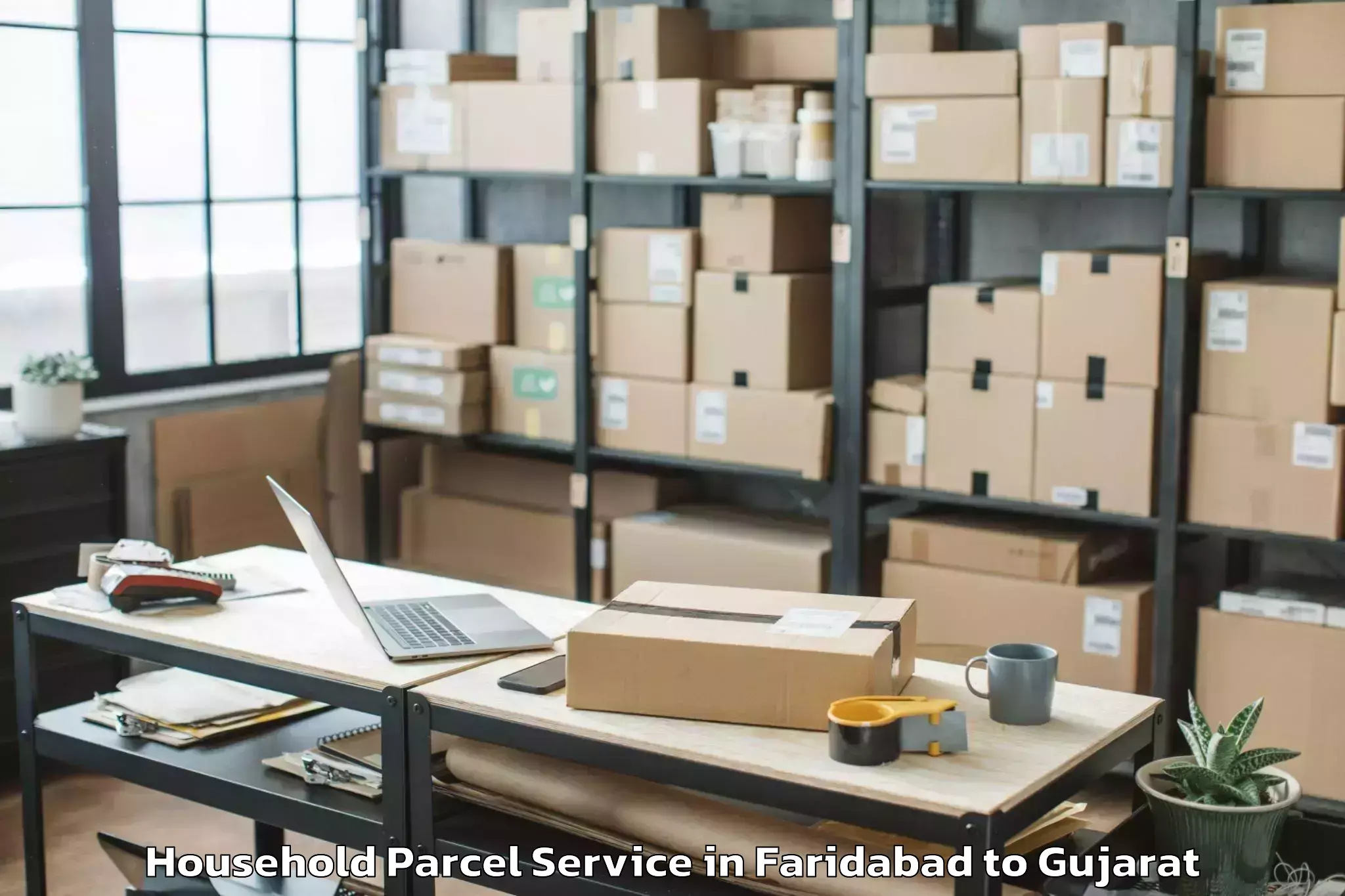 Reliable Faridabad to Vr Mall Surat Household Parcel